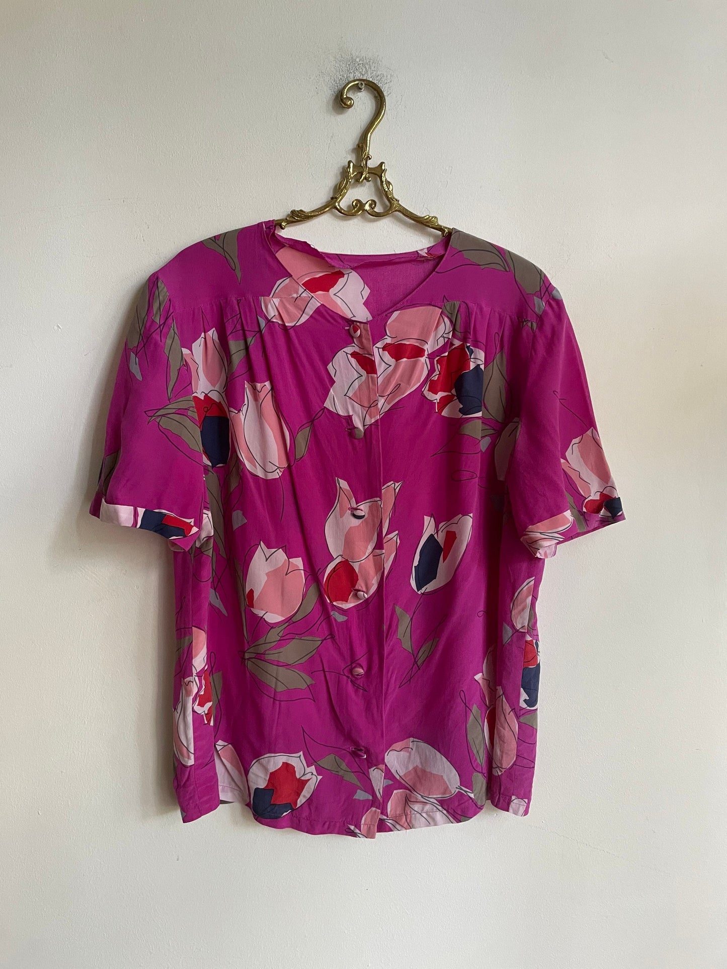 Vintage floral blouse in bold fuchsia with abstract tulip print, silk-feel slouchy fit top, romantic retro 90s aesthetic, Rachel Green vibe