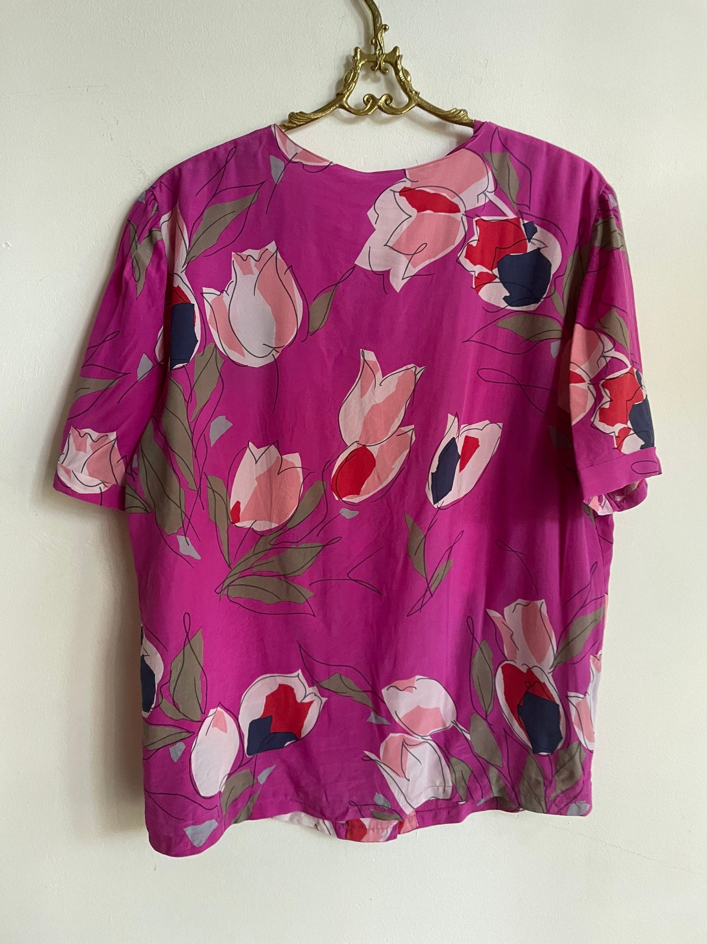 Vintage floral blouse in bold fuchsia with abstract tulip print, silk-feel slouchy fit top, romantic retro 90s aesthetic, Rachel Green vibe