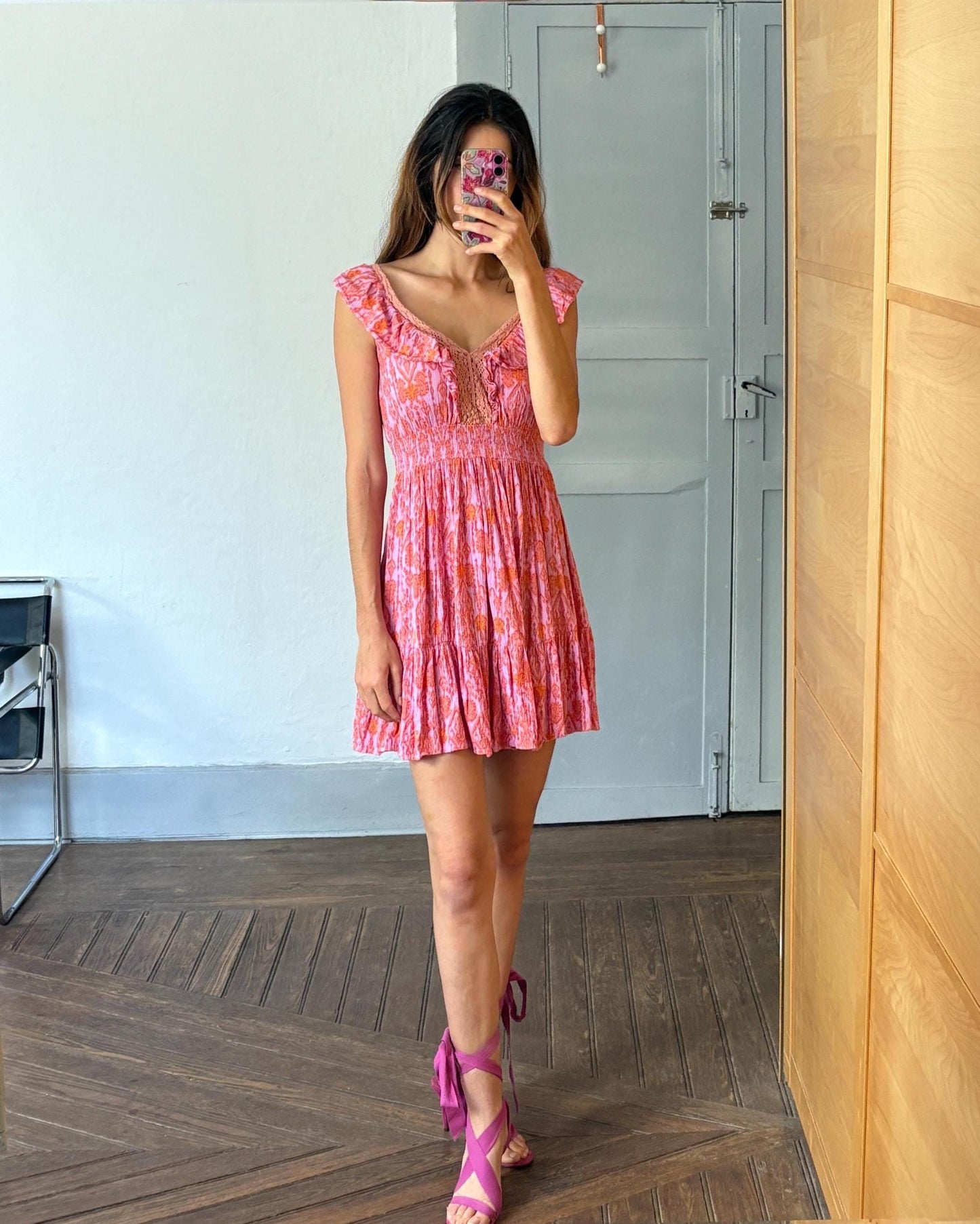 Boho ruffle mini dress, romantic summer look, vintage-inspired floral pink, deep V neckline, stretchy waist, size S