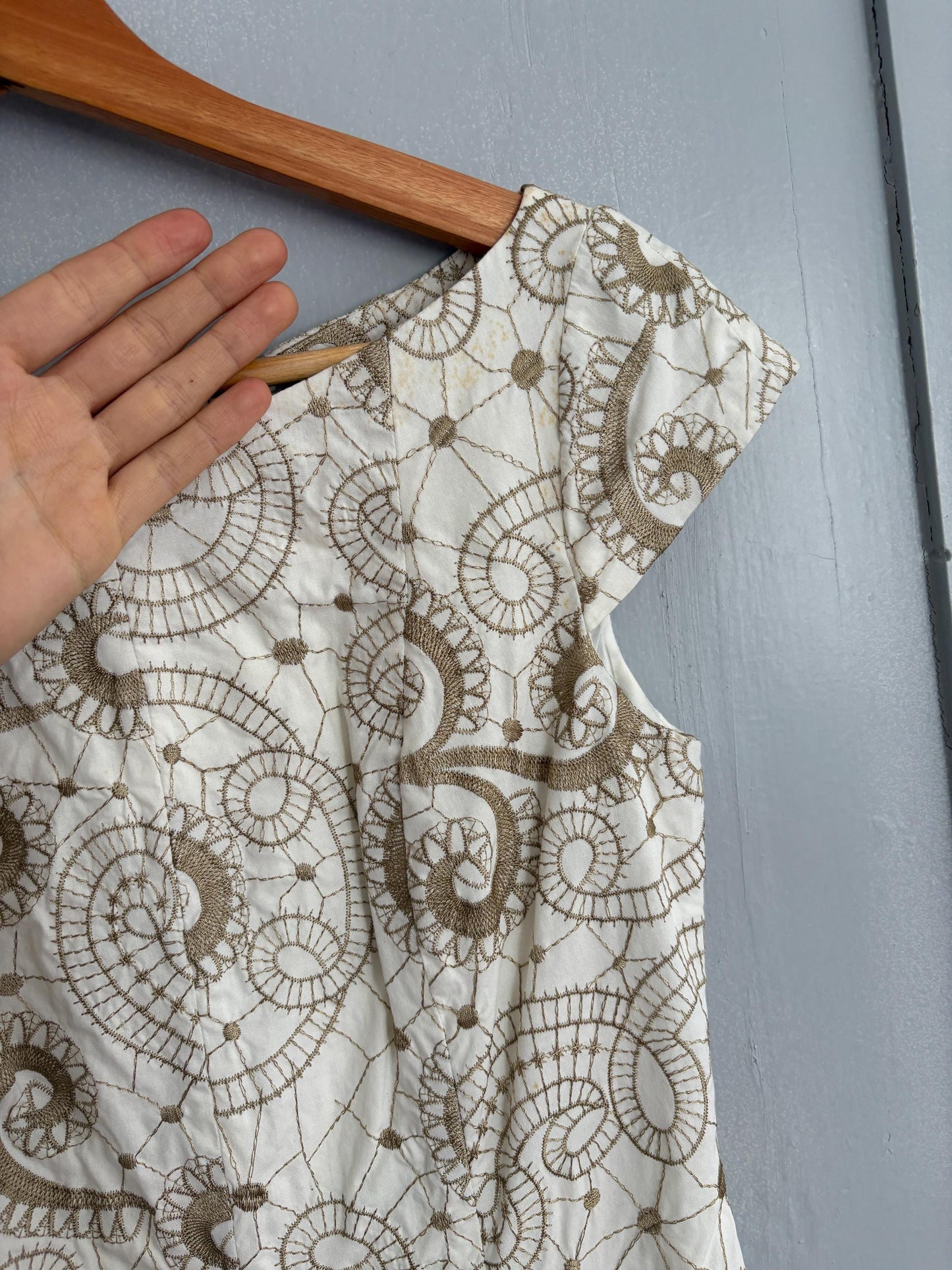 Vintage white embroidered fit and flare summer mini dress with cap sleeves and swirl floral pattern cotton elastane blend