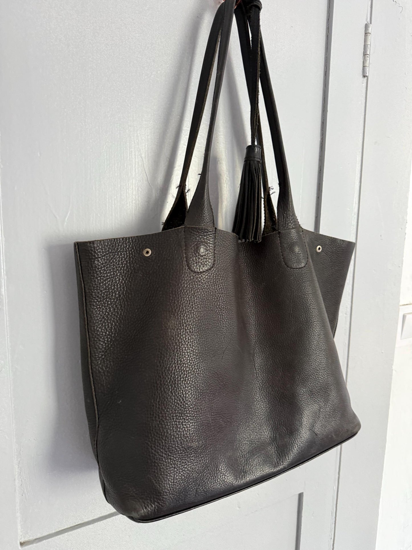 Black leather Minimalist stylish shopper, Luxe diaper bag, Tassel detail schoolbag