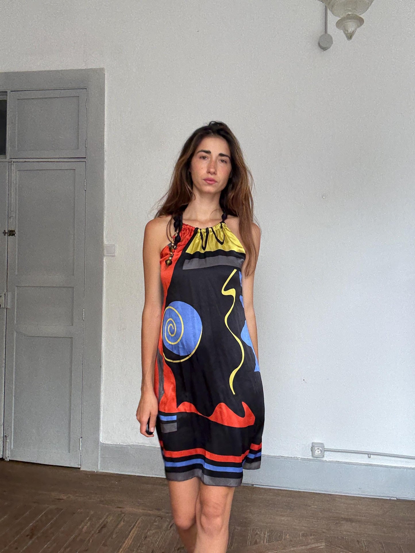 Brunella 100% silk halter mini dress with abstract art print & beaded straps – bold boho look, made in Spain