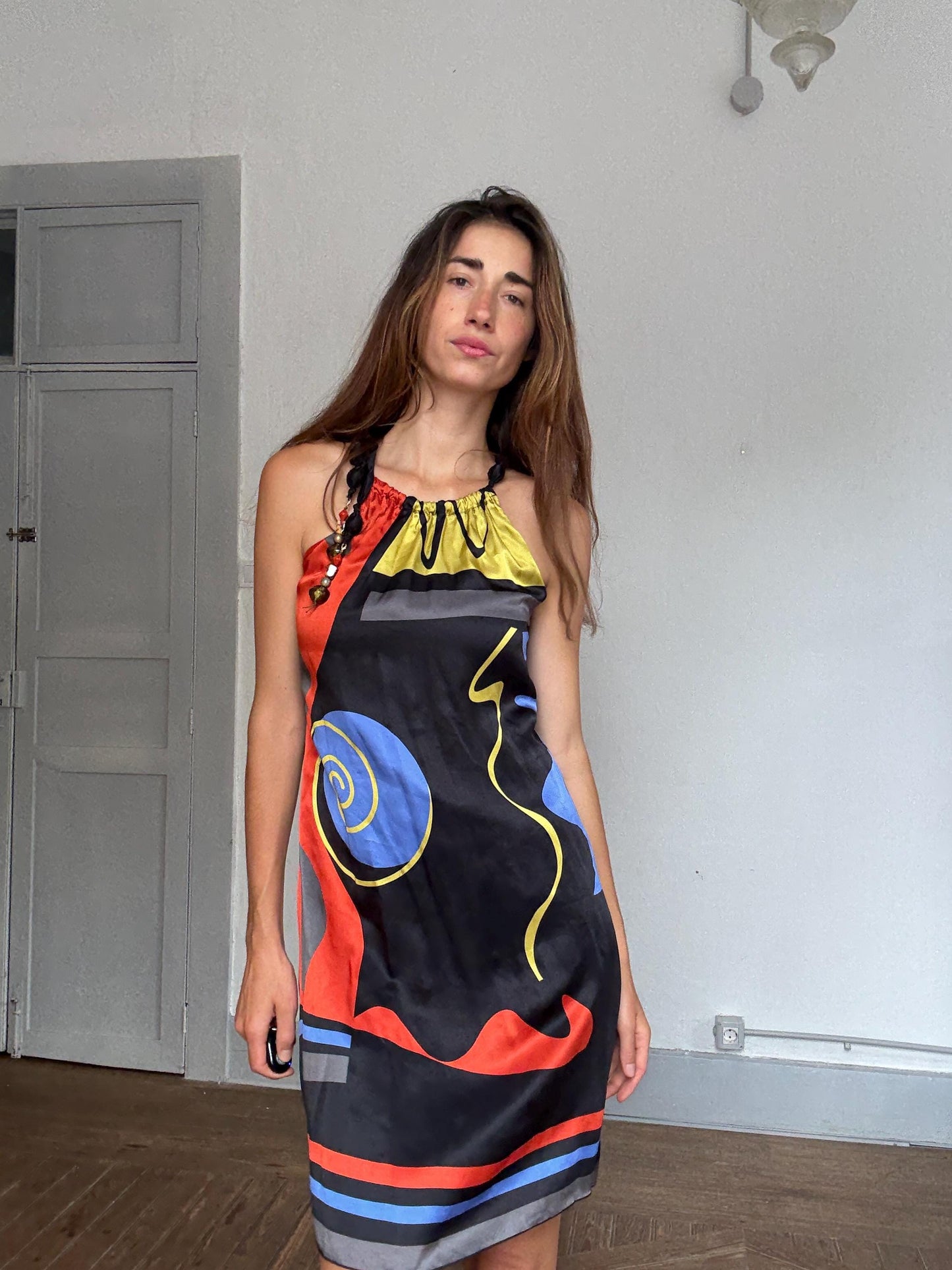 Brunella 100% silk halter mini dress with abstract art print & beaded straps – bold boho look, made in Spain