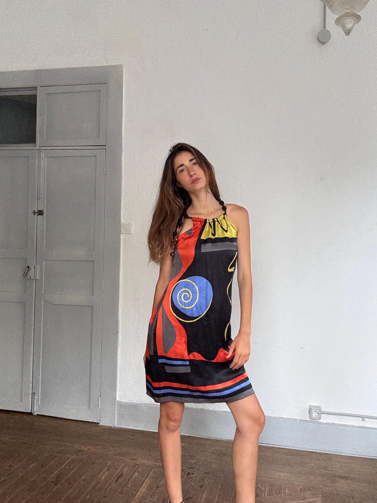 Brunella 100% silk halter mini dress with abstract art print & beaded straps – bold boho look, made in Spain