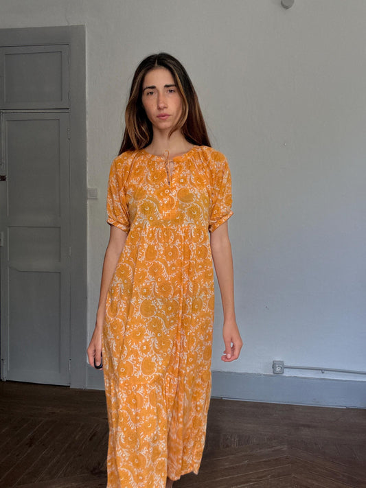 Natura floral maxi dress in 100% cotton – golden orange boho style, tiered silhouette, relaxed summer fit