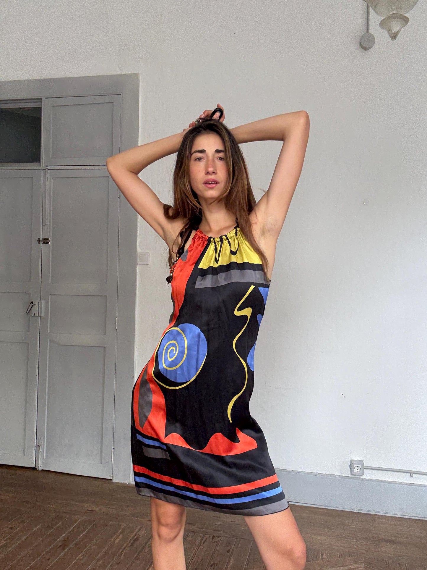 Brunella 100% silk halter mini dress with abstract art print & beaded straps – bold boho look, made in Spain