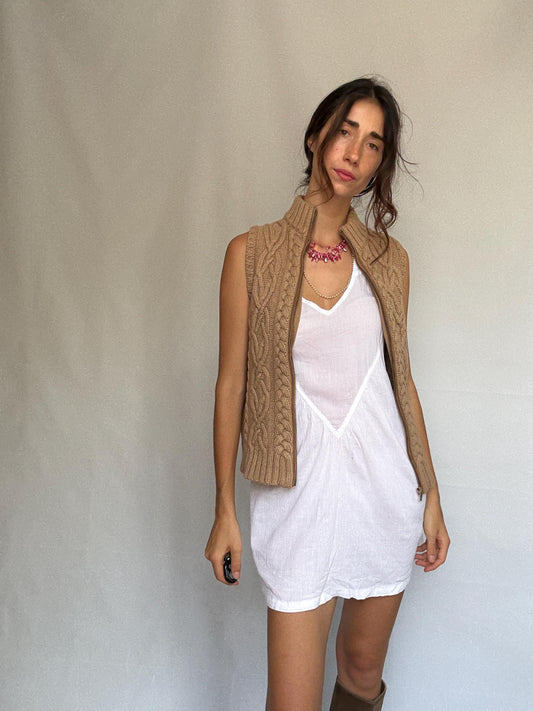 Massimo Dutti beige knit vest, wool Italian yarn, fitted silhouette, cable knit pattern, high ribbed collar, elegant Timothée Chalamet vibe