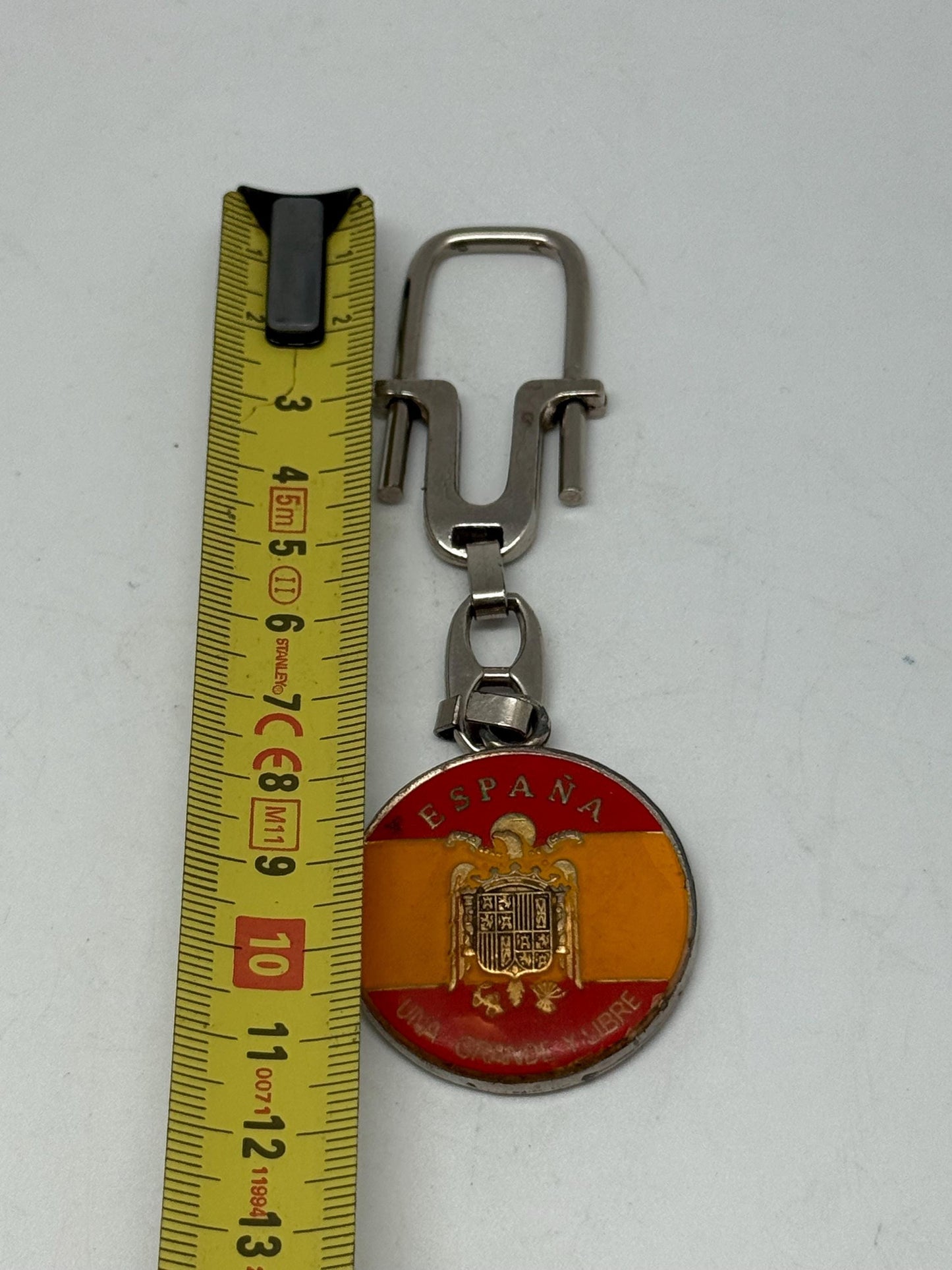 Vintage Spanish Coat of Arms Keychain, silver polished metal, medallion design, patriotic emblem, collectible item, stylish accessory