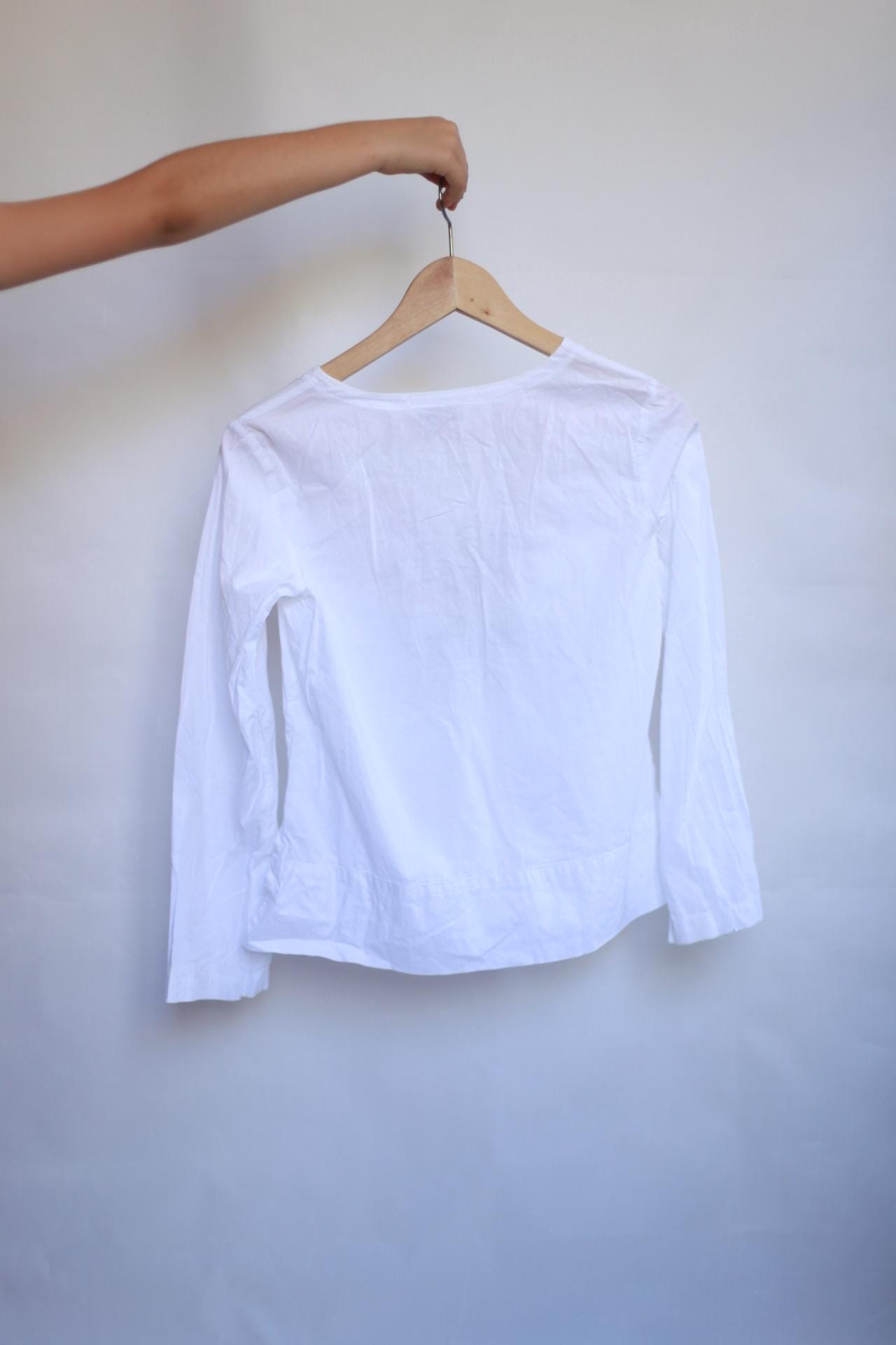 Vintage white children's blouse, cotton feel, relaxed fit, hand embroidered detail, minimalist folkloric aesthetic, US 10, EU 154 kids