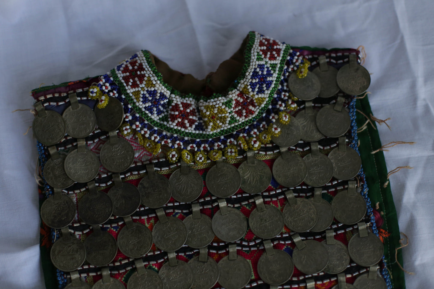 Afgan Relic, Antique handmade Afgan childrens bodice decorated with copper rial coins, Ethnographic