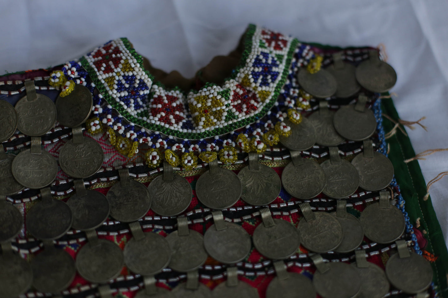 Afgan Relic, Antique handmade Afgan childrens bodice decorated with copper rial coins, Ethnographic