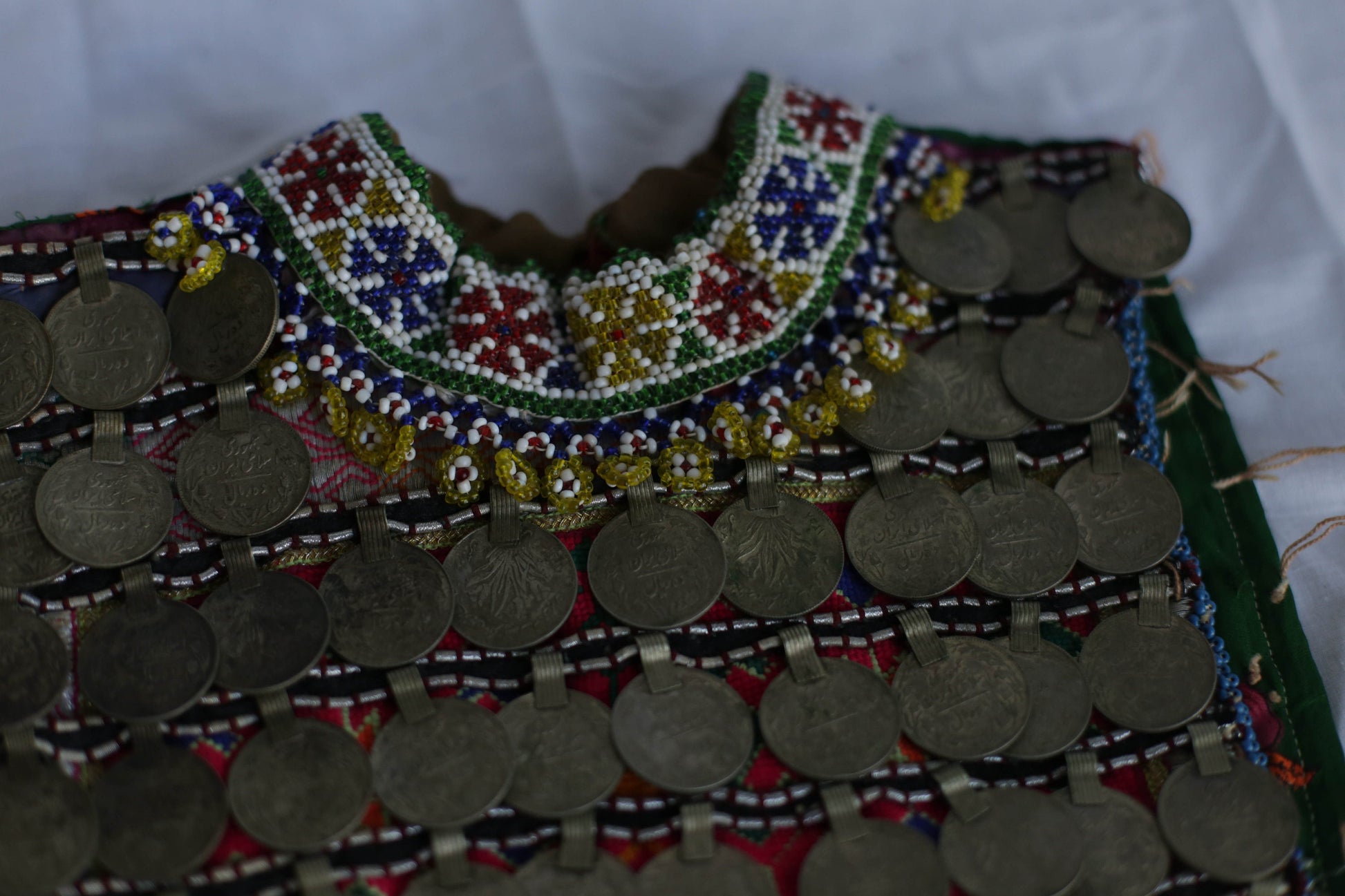 Afgan Relic, Antique handmade Afgan childrens bodice decorated with copper rial coins, Ethnographic