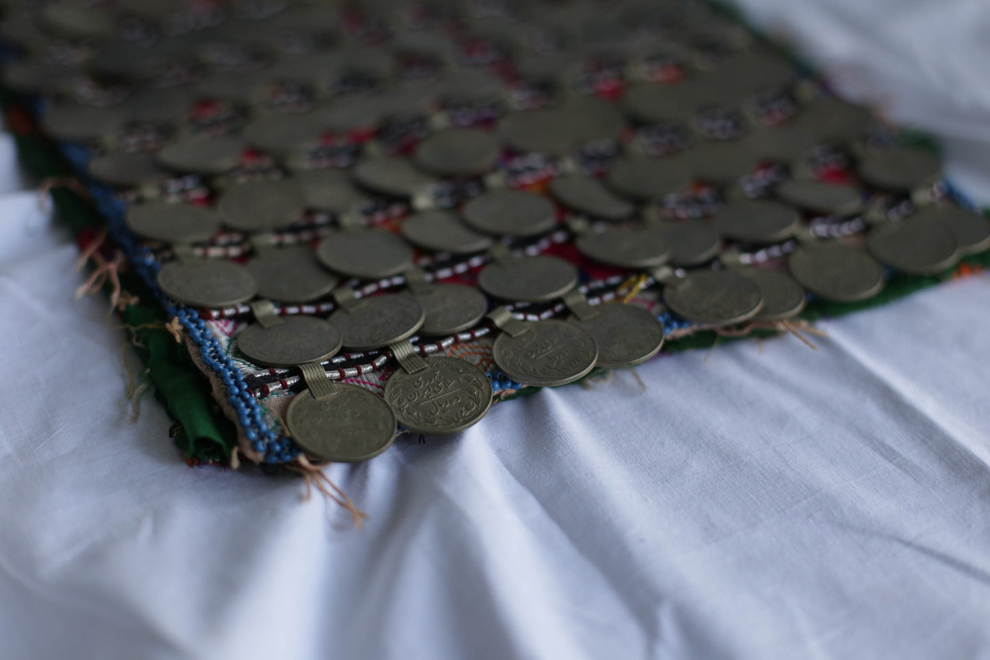 Afgan Relic, Antique handmade Afgan childrens bodice decorated with copper rial coins, Ethnographic