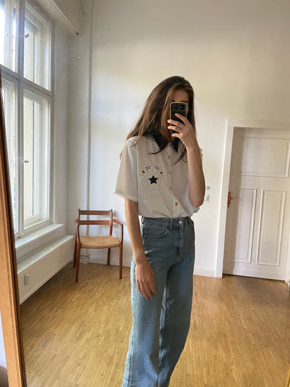 Vintage White Embroidered Blouse With Golden Buttons — fabric close-up