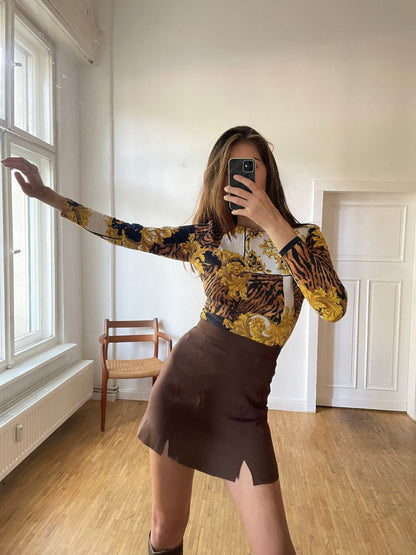 Vintage Baroque Tiger Print Bodysuit — fabric close-up