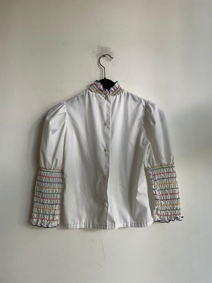 Vintage Embroidered Puff Sleeve Blouse — fabric close-up