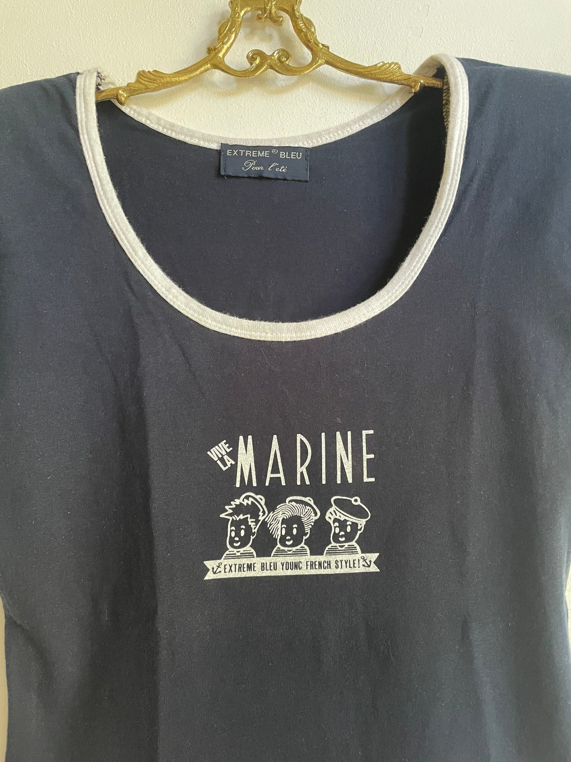 Vintage Marine body, Retro blue bodysuit, Comfortable open neck top with padded shoulders.