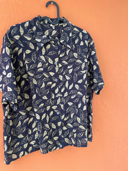 Vintage Black Patterned Blouse — fabric close-up