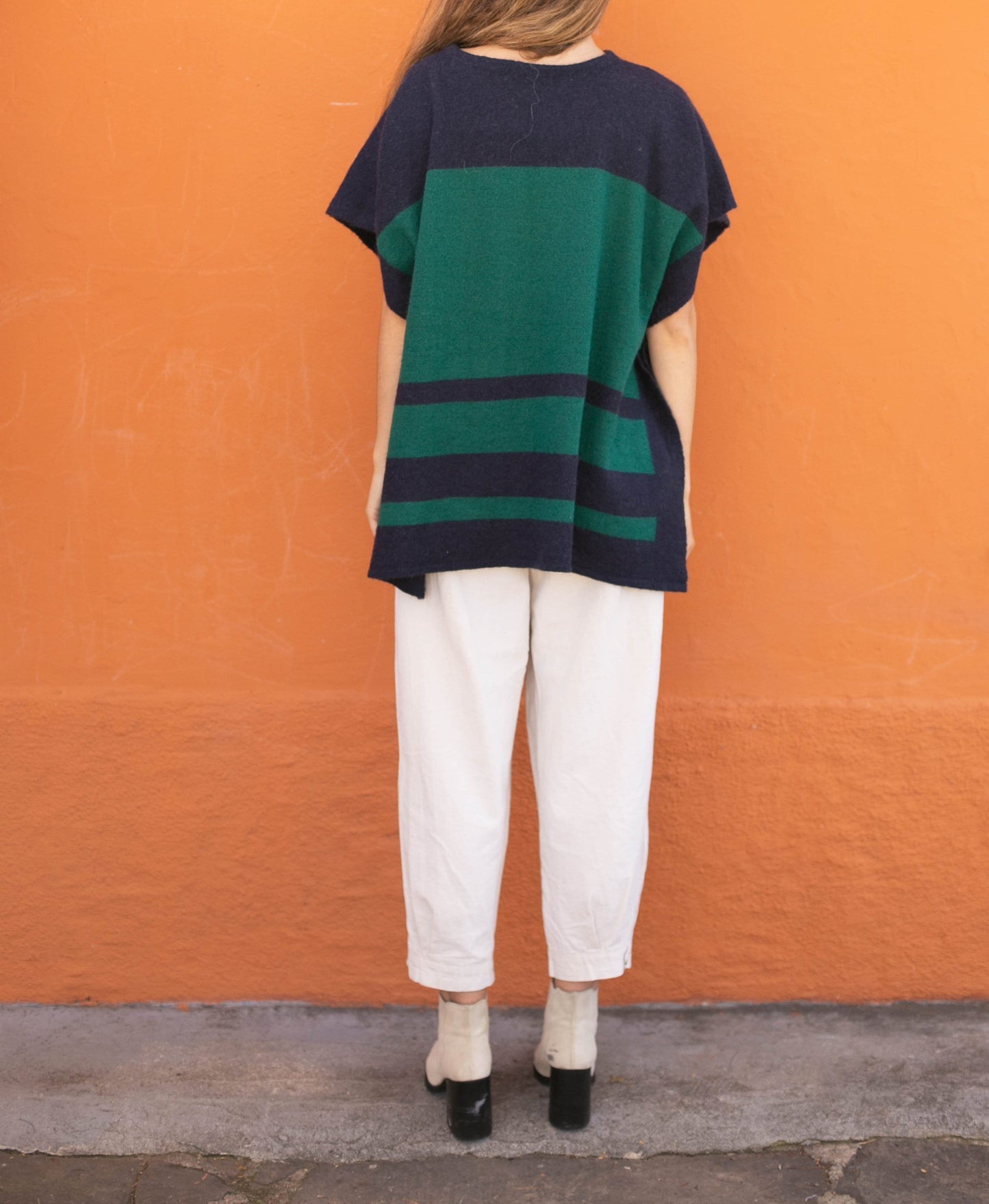 Wool poncho in navy blue and green