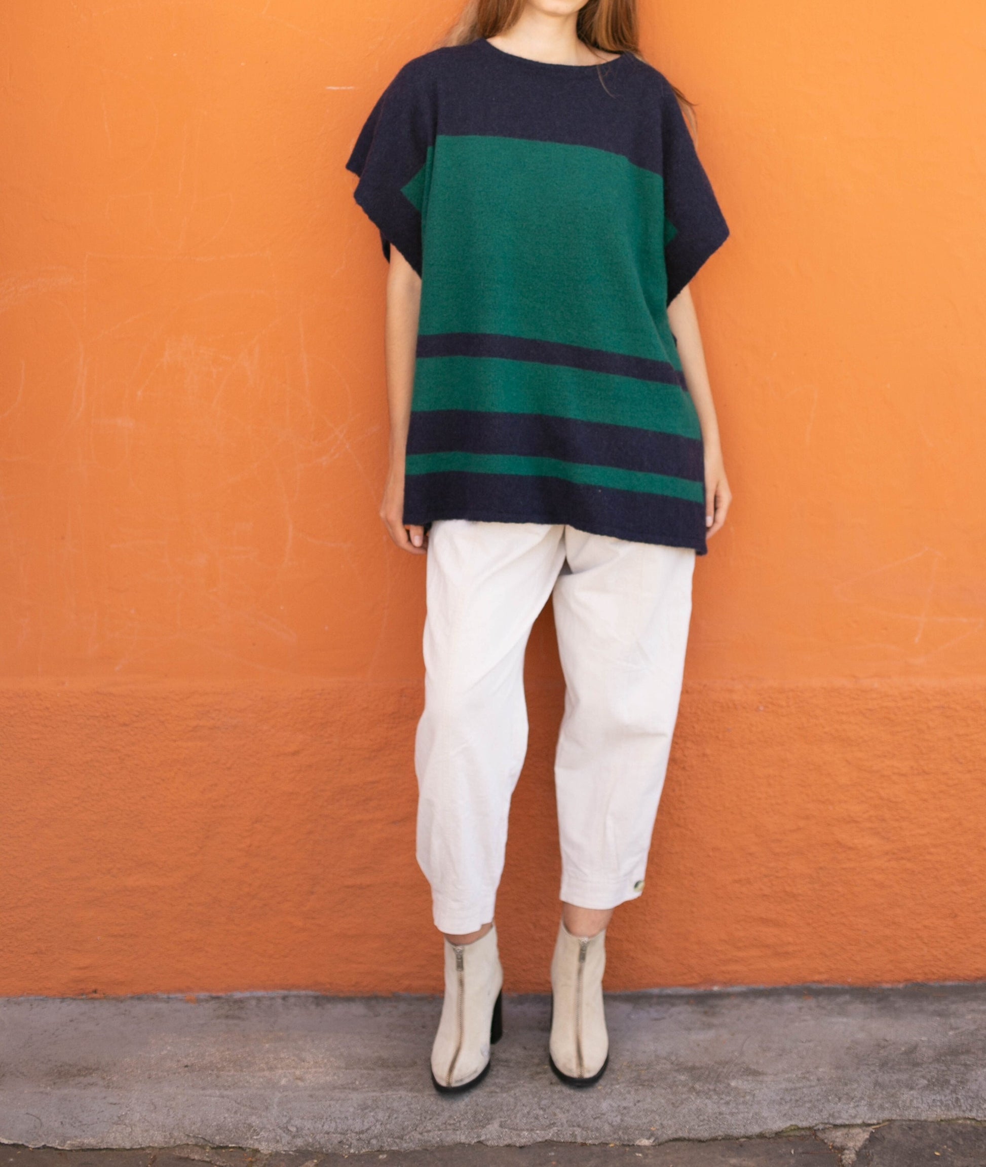 Wool poncho in navy blue and green