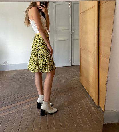 Vintage Yellow & Black Y2K Graphic Skirt — fabric close-up