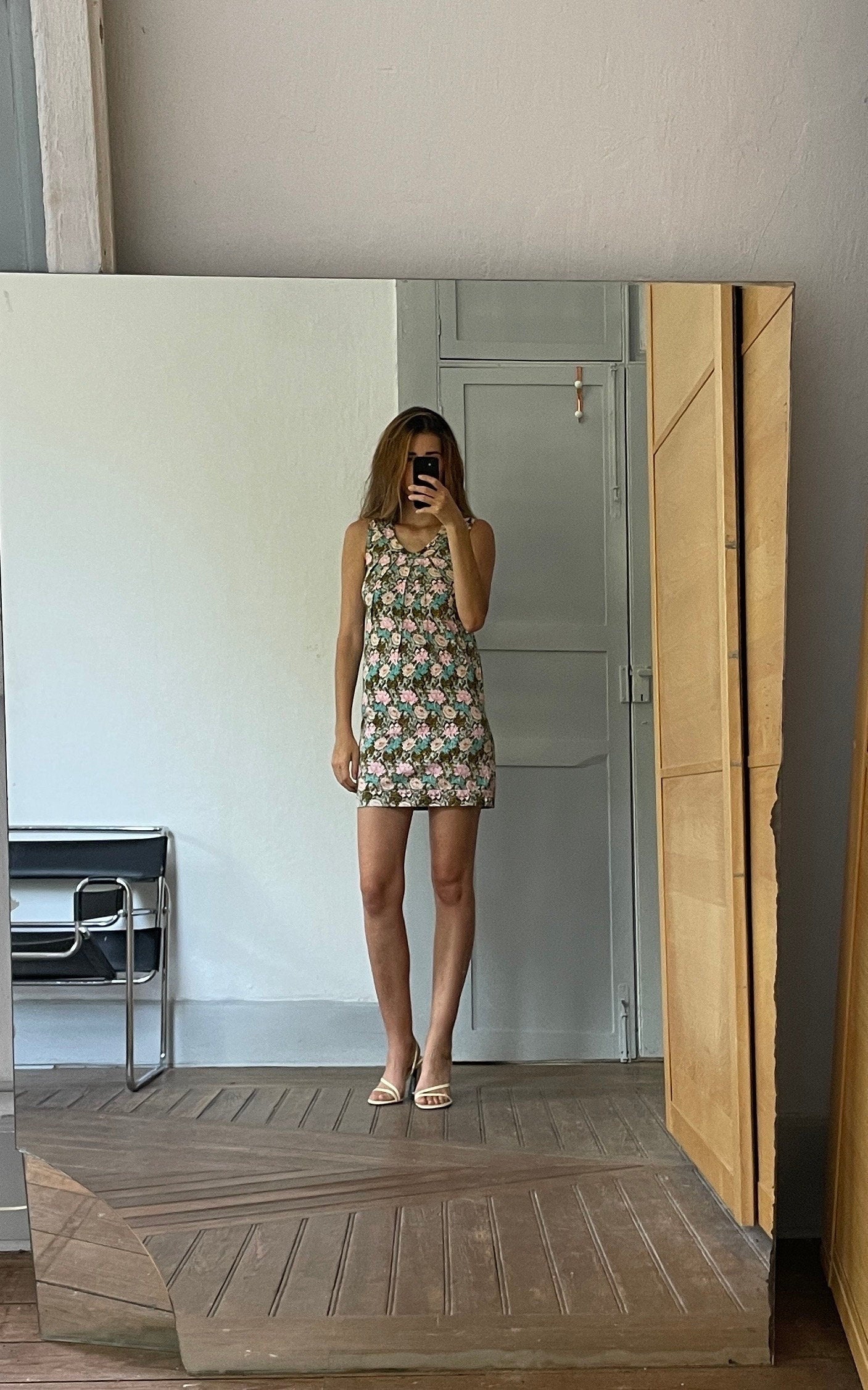 Vintage designer dress by Almatrichi. Nice colourful floral pattern.Pencil dress fit.