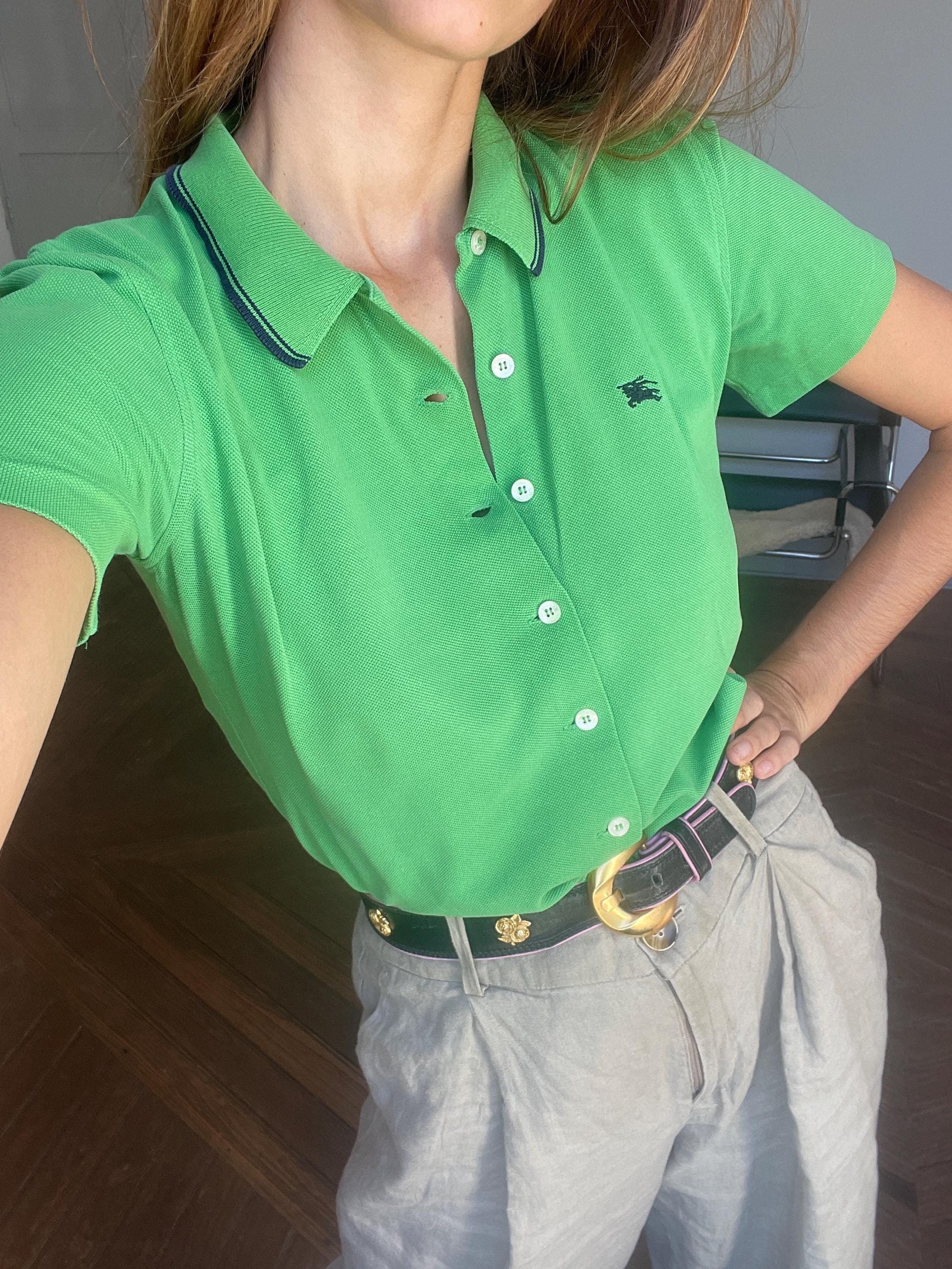 Vintage vibrant green button down polo shirtby Burberrys of London.