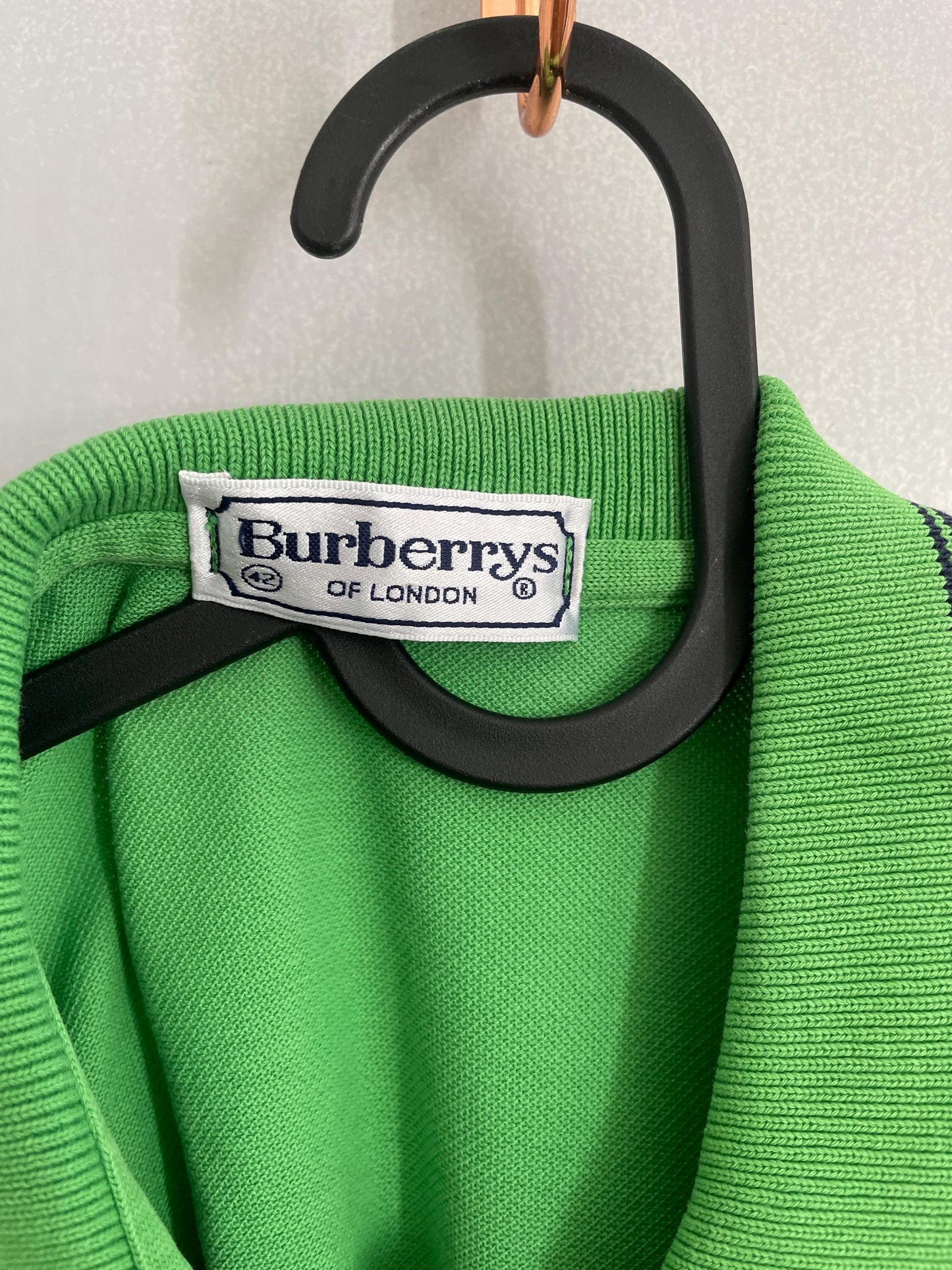 Vintage Burberrys green polo blouse – size S / EU 36, short sleeve, navy trim, preppy designer top