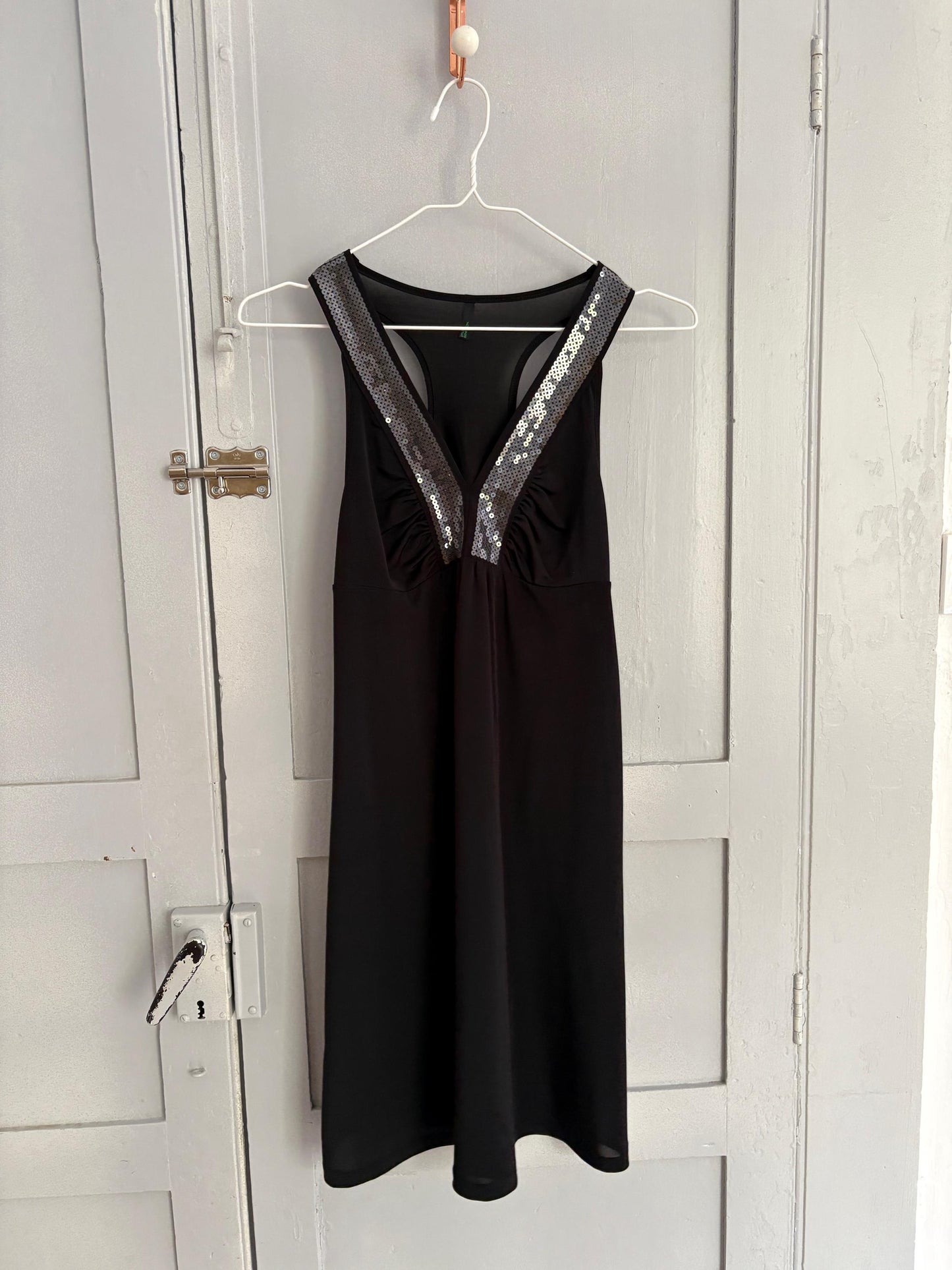 Elegant black mini dress with sequin decorated neckline, Size XS