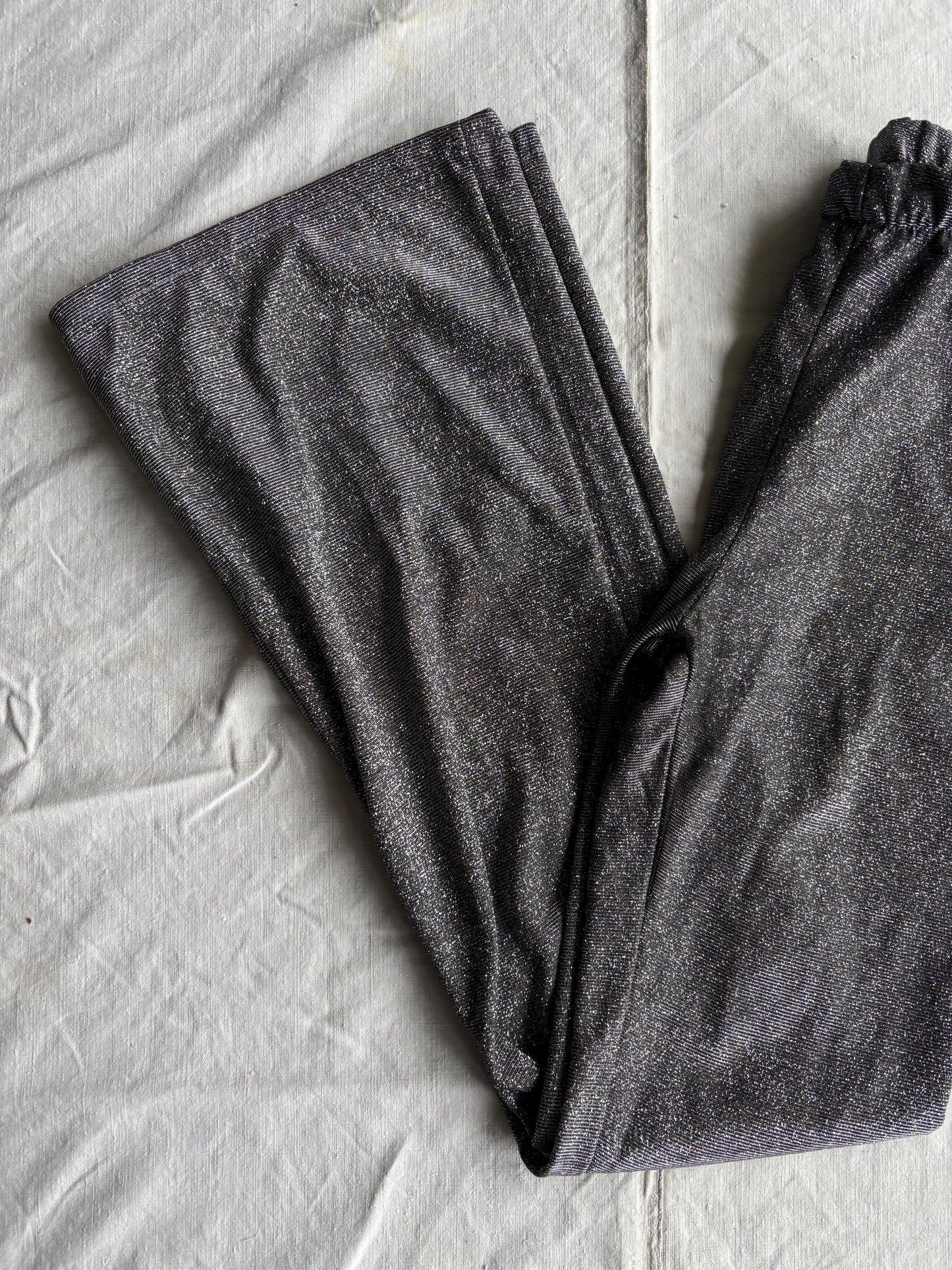 High Waist Silver Glitter Flared Pants — fabric close-up