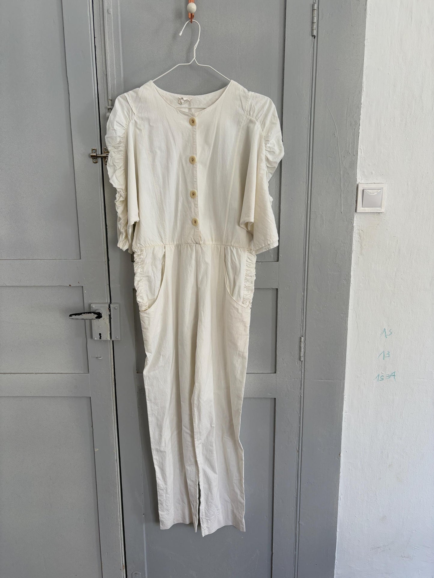 Vintage White Puff Sleeve Jumpsuit — fabric close-up