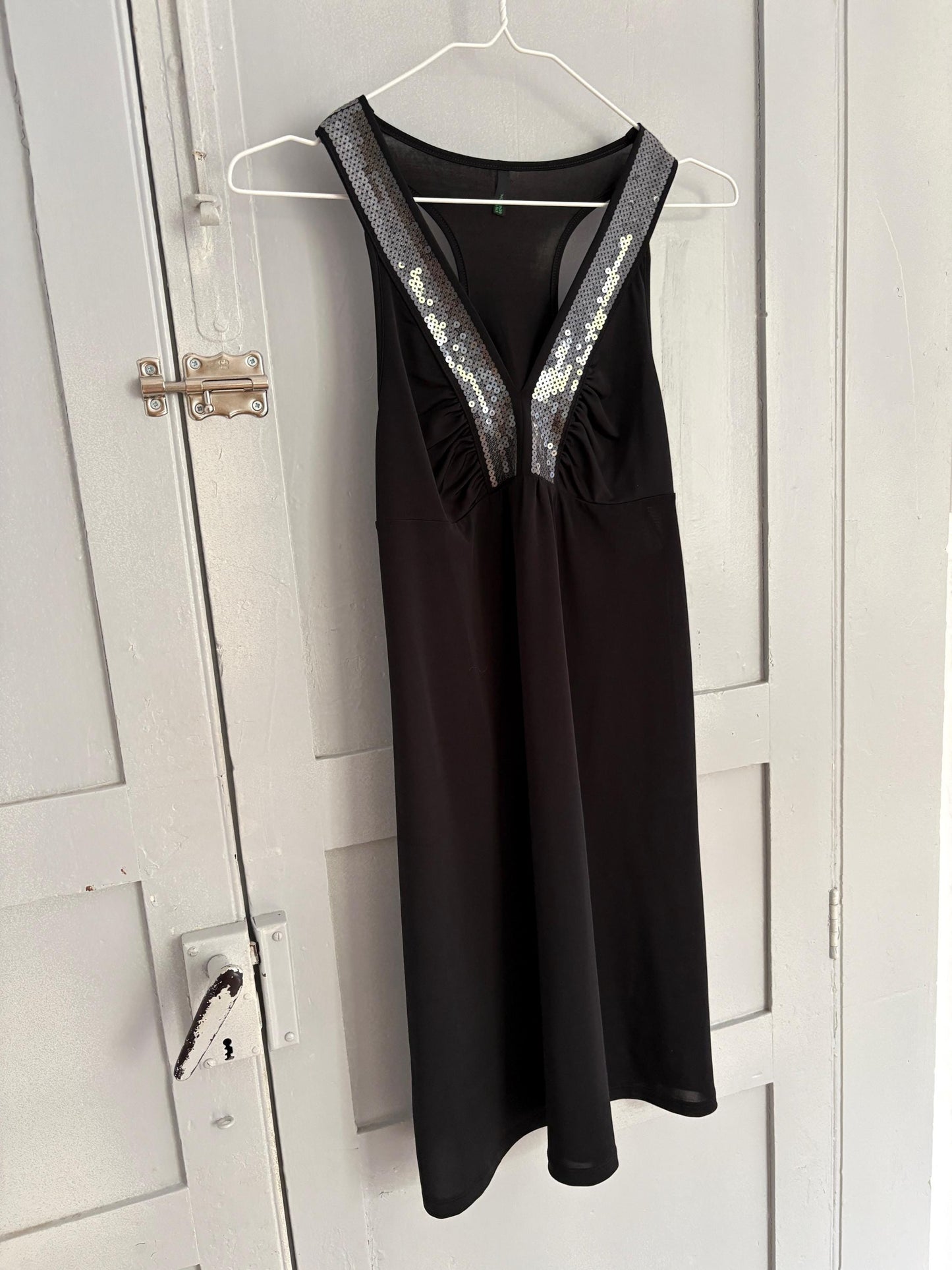 Elegant black mini dress with sequin decorated neckline, Size XS