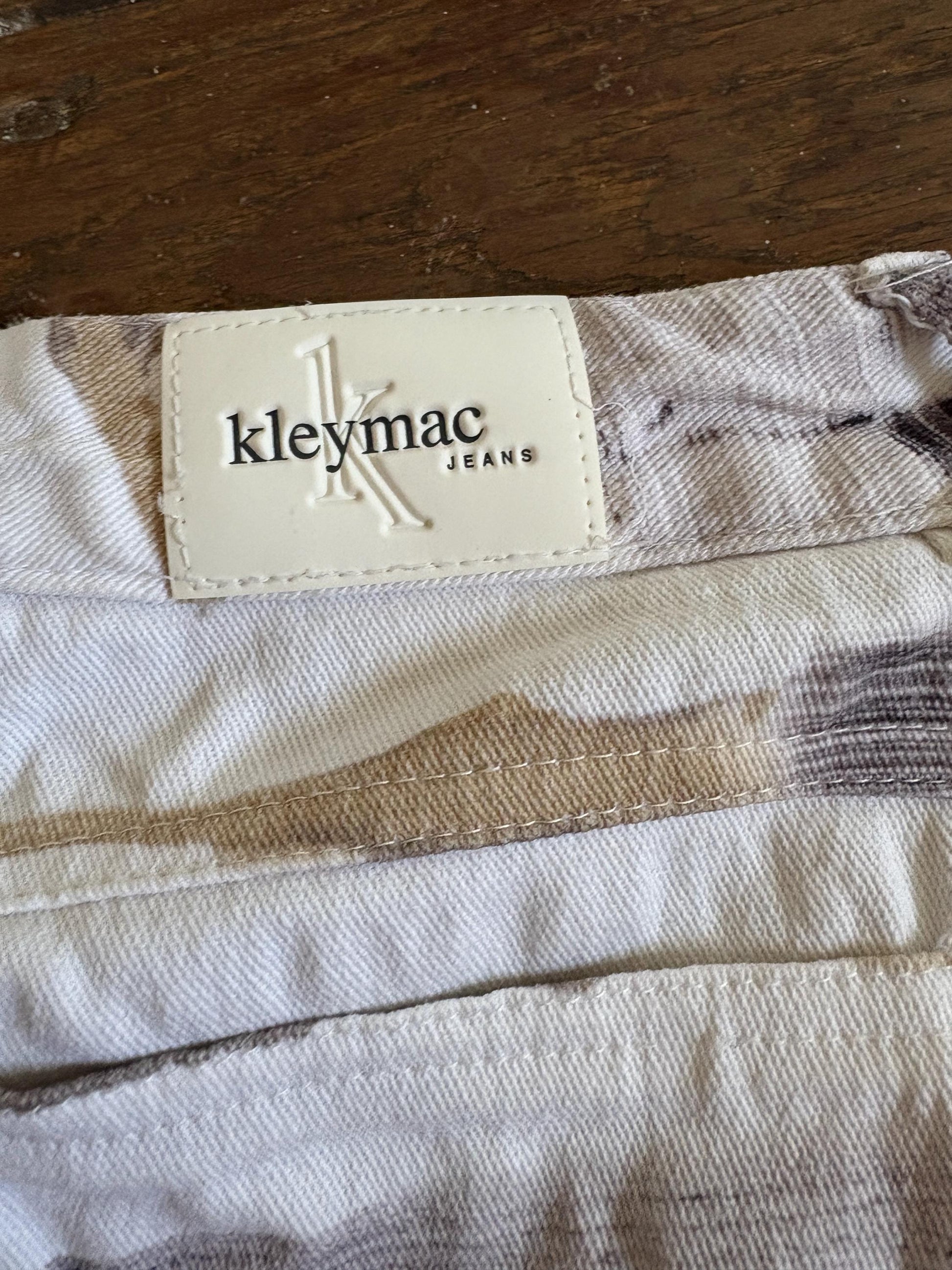 Vintage Kleymac printed jeans, artistic Y2K straight-leg pants, statement high-waisted denim, bold retro aesthetic, Linea Kleymac Sport