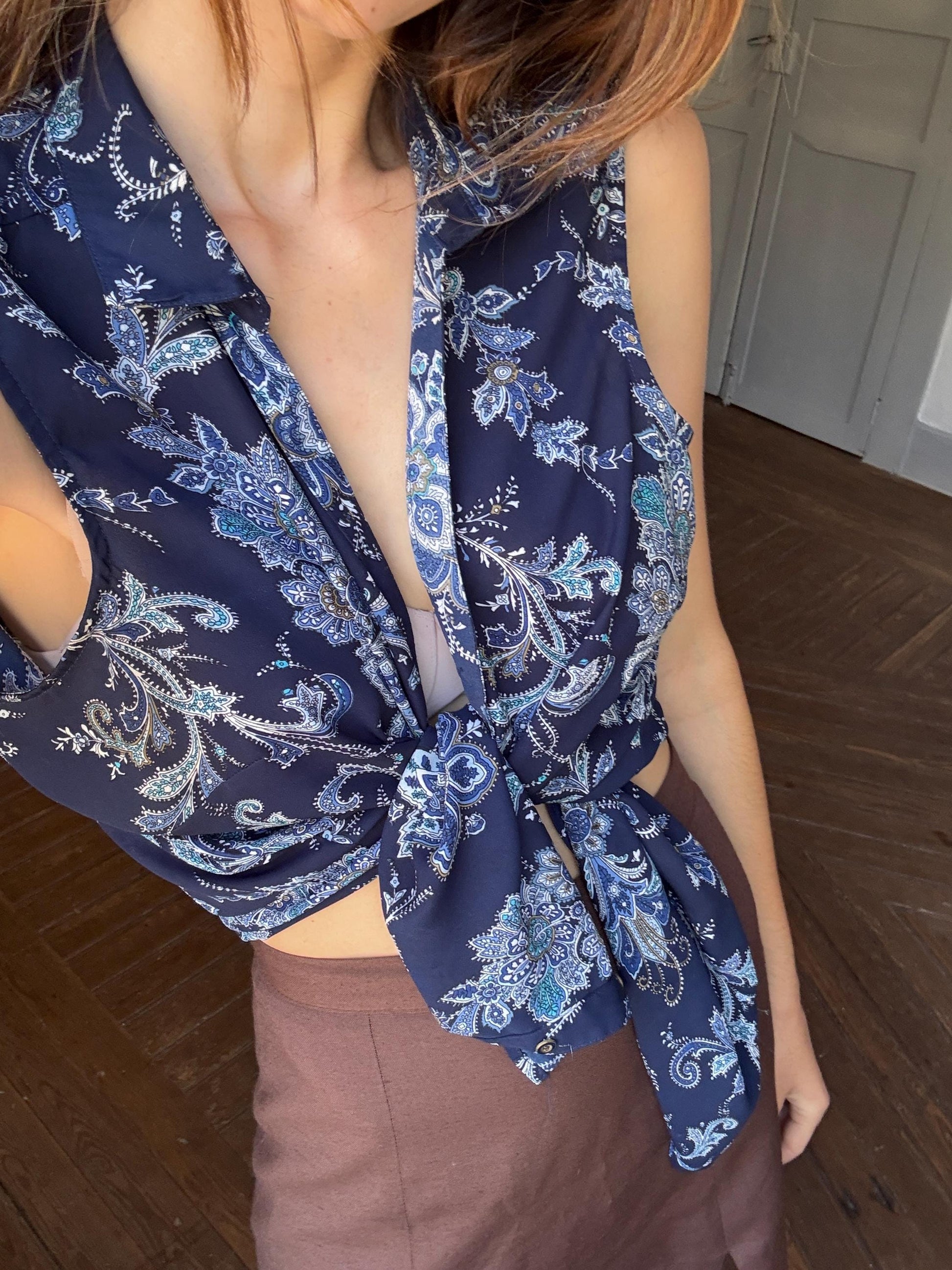 Vintage floral sleeveless blouse, navy blue summer button-up, boho chic retro top, lightweight paisley shirt, tie-front or loose-fit styling