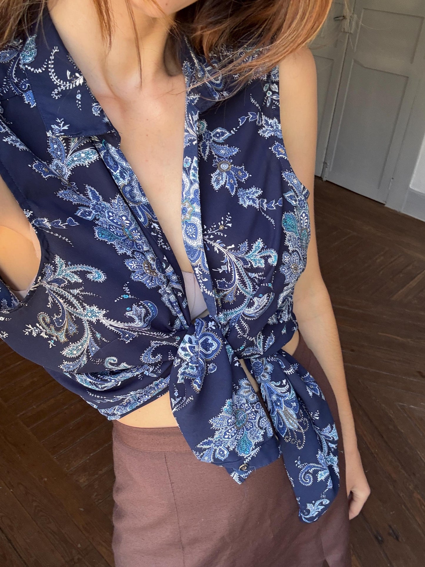 Vintage floral sleeveless blouse, navy blue summer button-up, boho chic retro top, lightweight paisley shirt, tie-front or loose-fit styling
