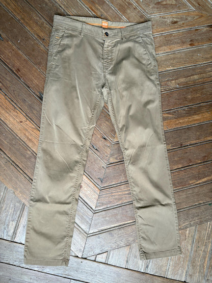 Brown Cotton BOSS Orange Trousers for Men — fabric close-up