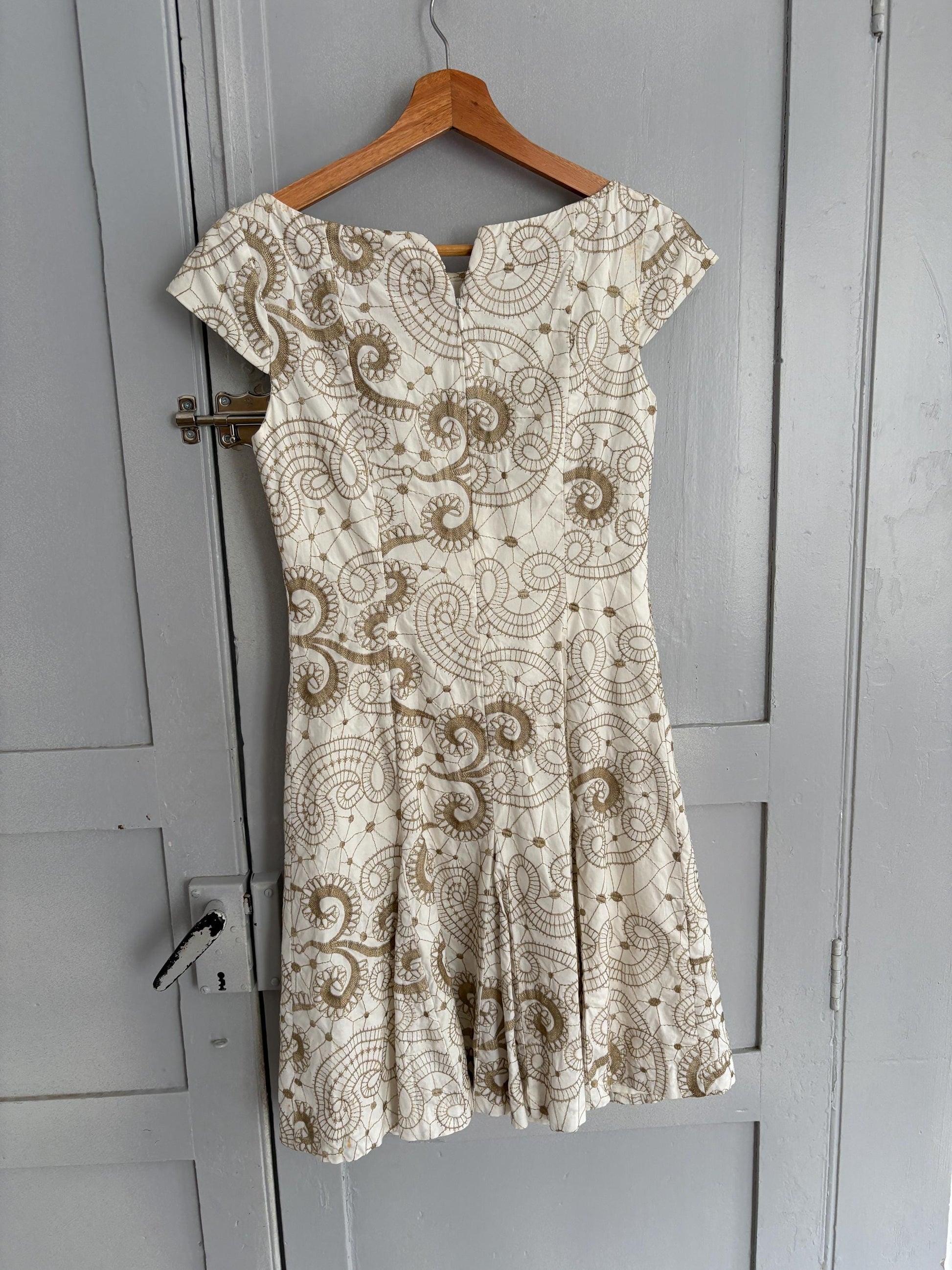 Vintage white embroidered fit and flare summer mini dress with cap sleeves and swirl floral pattern cotton elastane blend