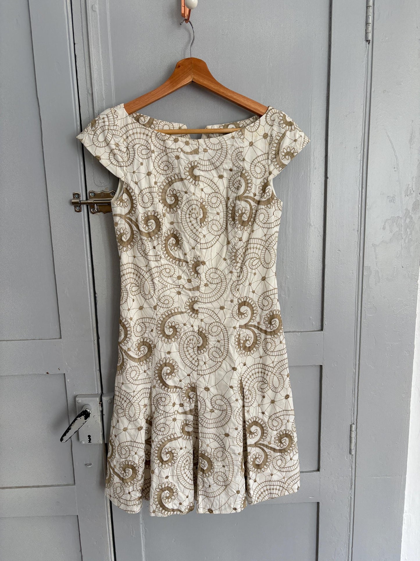 Vintage white embroidered fit and flare summer mini dress with cap sleeves and swirl floral pattern cotton elastane blend