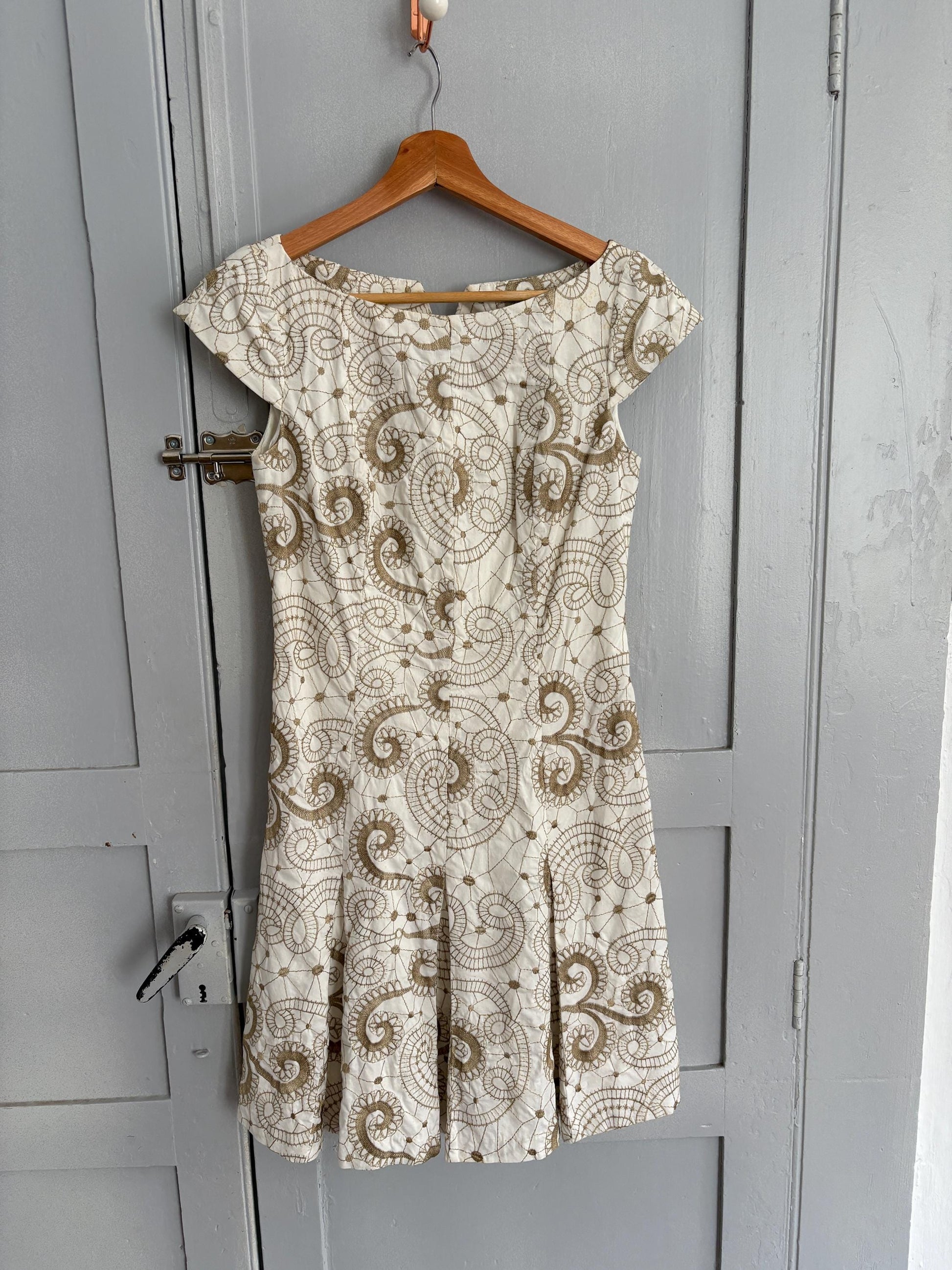 Vintage white embroidered fit and flare summer mini dress with cap sleeves and swirl floral pattern cotton elastane blend