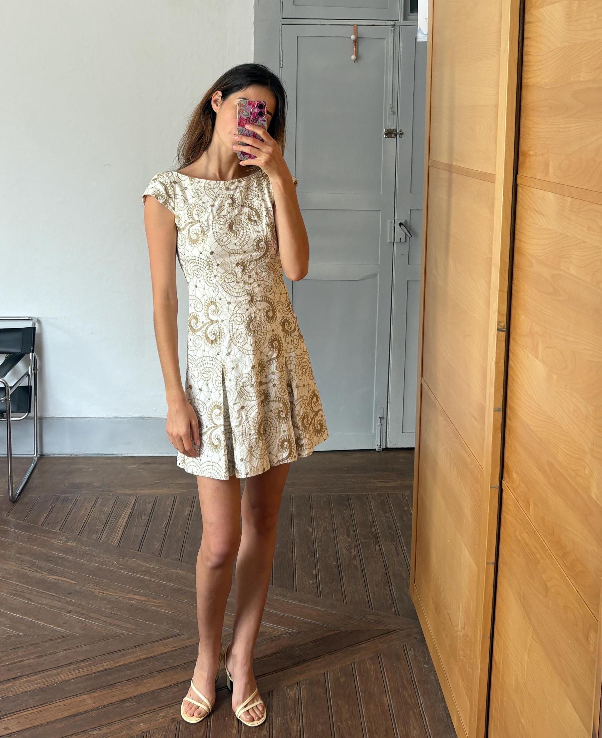 Vintage white embroidered fit and flare summer mini dress with cap sleeves and swirl floral pattern cotton elastane blend