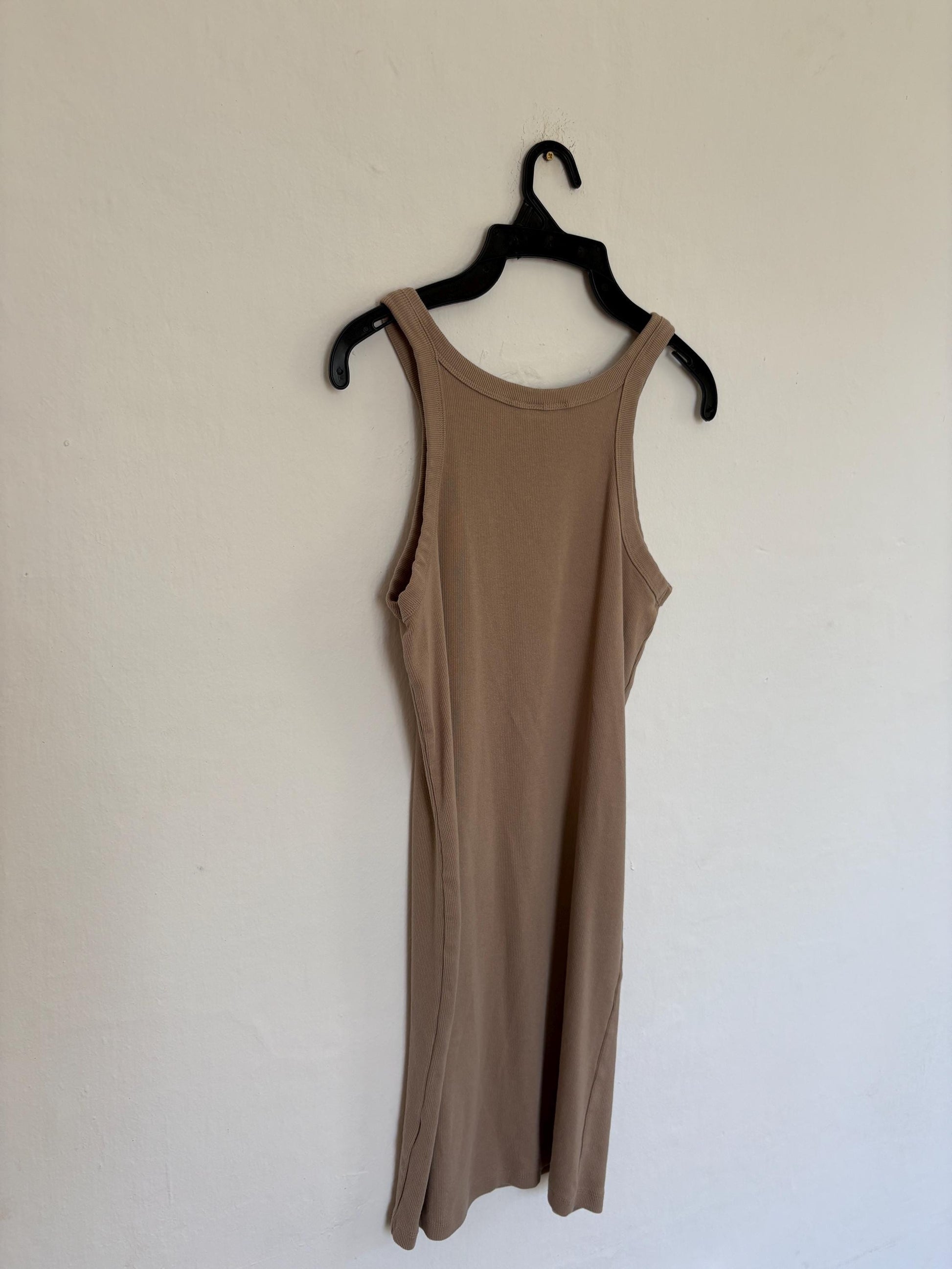 Nude ribbed bodycon mini dress, Y2K inspired, racerback style, sleeveless tank, stretchy cotton blend, fitted, sexy casual look