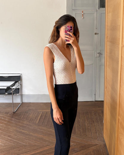 Vintage White Sheer Bodysuit With Deep V Neckline — fabric close-up