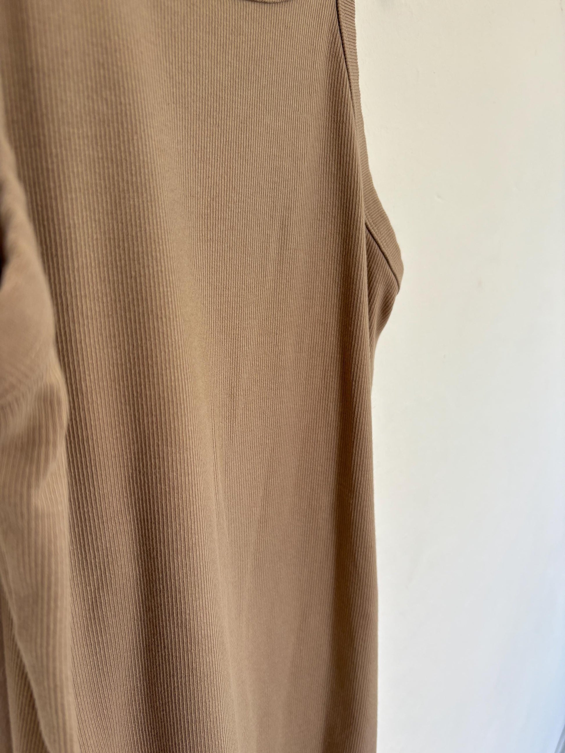 Nude ribbed bodycon mini dress, Y2K inspired, racerback style, sleeveless tank, stretchy cotton blend, fitted, sexy casual look