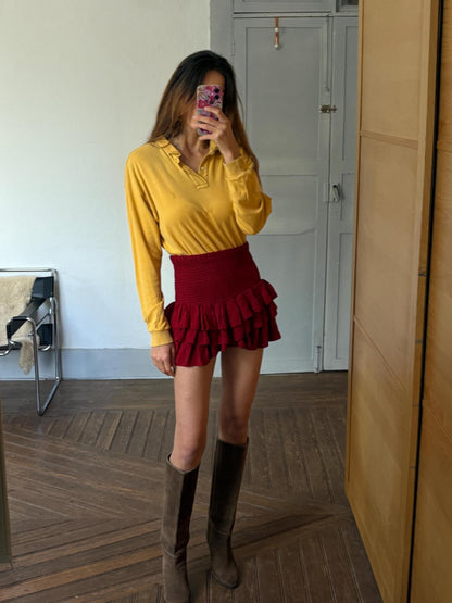 Vintage Yves Saint Laurent Mustard Polo Shirt — fabric close-up