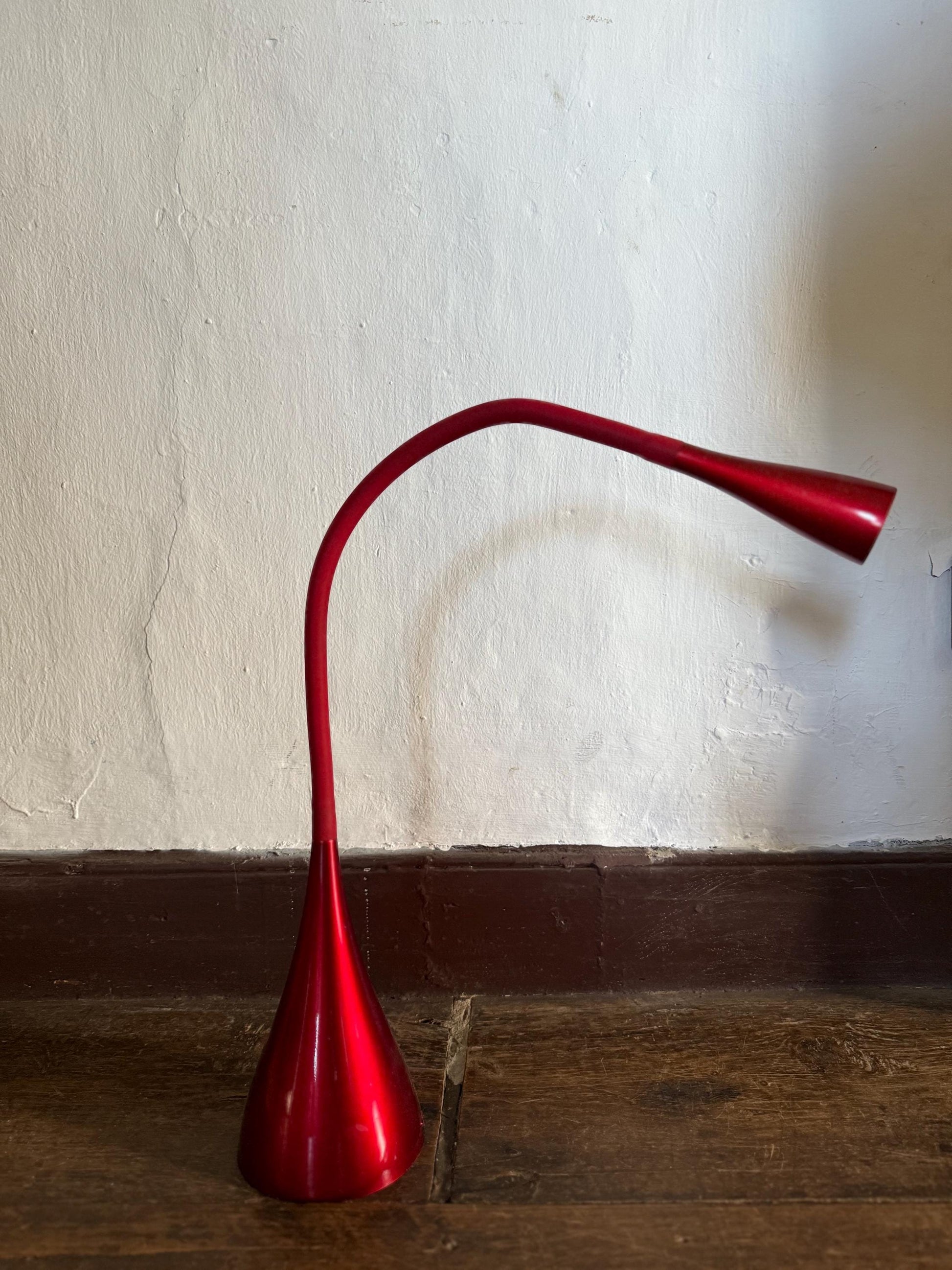 Sculptural red wavy table lamp with flexible neck, touch switch, modern space-age vibe, bold statement lighting, sturdy vintage build