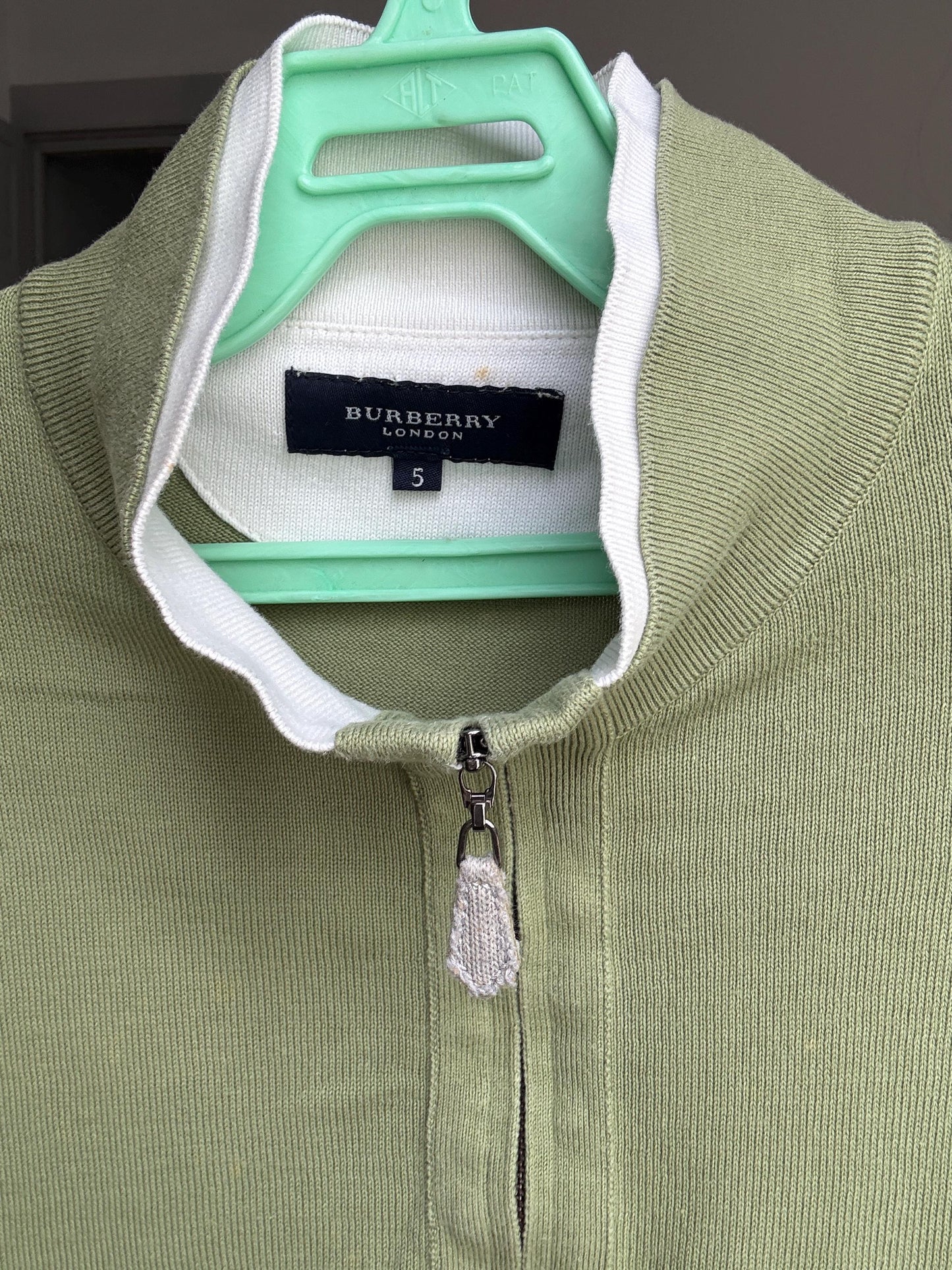 Vintage Burberry London polo jumper – sage green zip collar, tag size 5, 100% cotton, unisex fit, styled on woman, classic Y2K look