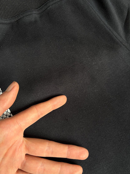 Stella McCartney Black Cropped Track Pants — fabric close-up