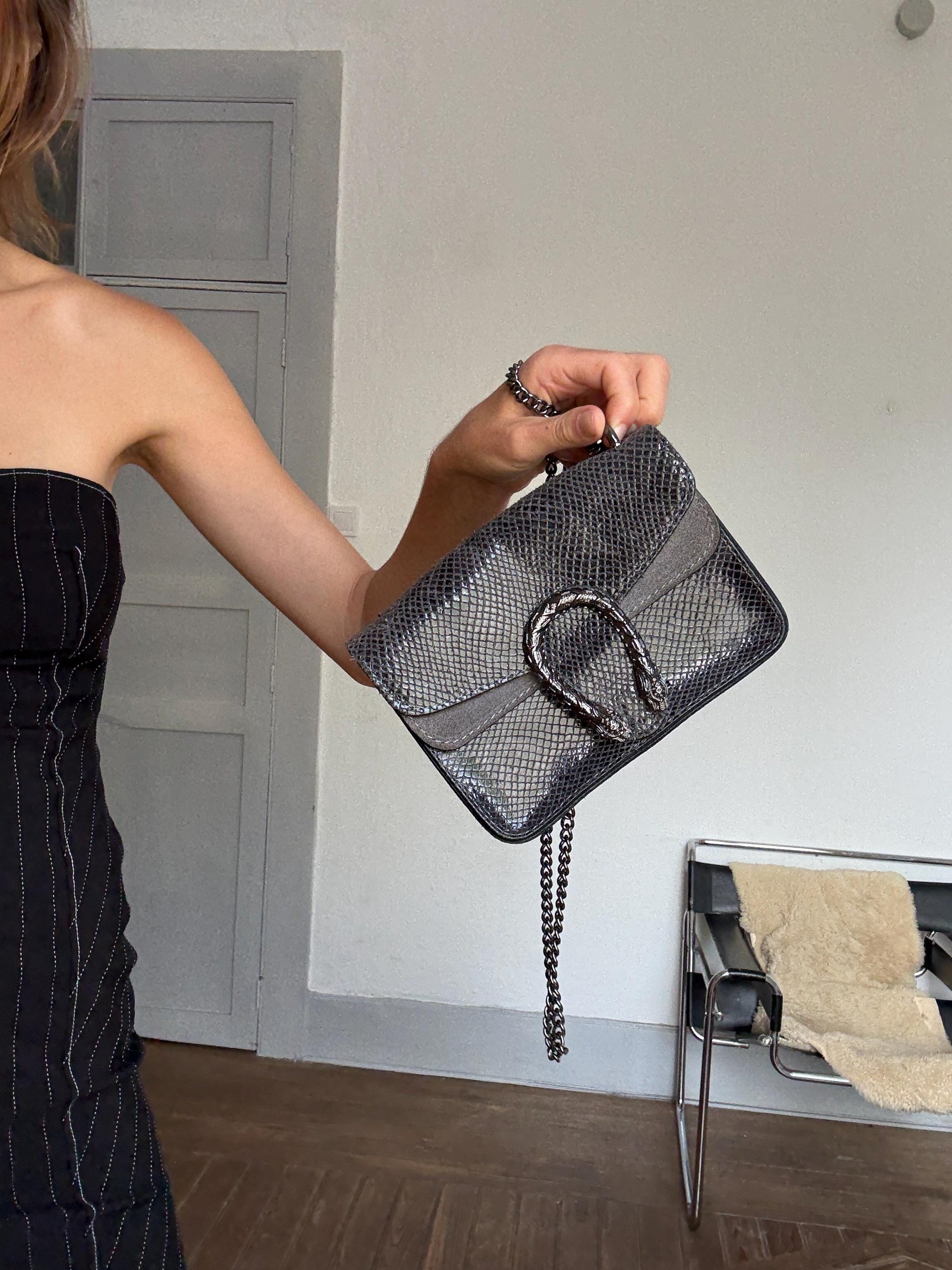 Italian Leather Crossbody Bag With Snake Buckle — fabric close-up