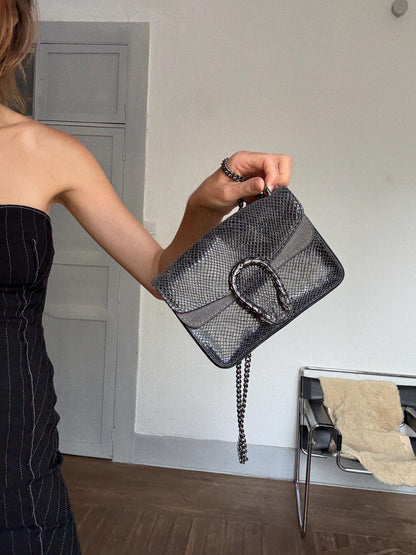 Italian Leather Crossbody Bag With Snake Buckle — fabric close-up