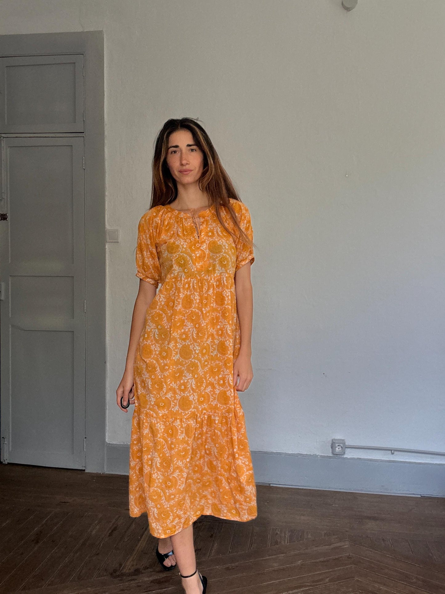 Natura floral maxi dress in 100% cotton – golden orange boho style, tiered silhouette, relaxed summer fit